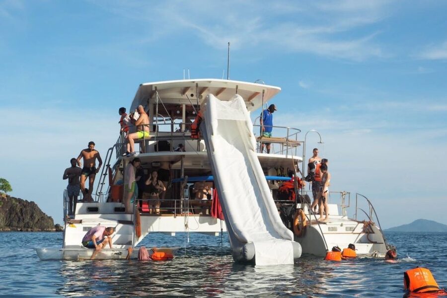 Amazing Coral Island & Sunset Dinner with Power Catamaran - Promthep Cape fishing and dinner onboard, where the day slows down
