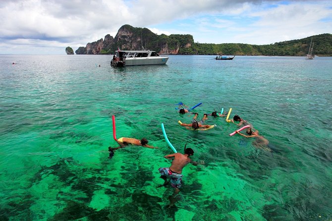 Blu Anda Catamaran to Phi Phi from Phuket - Ko Phi Phi Lee, Maya Bay area kayaking, and the pass-by highlights