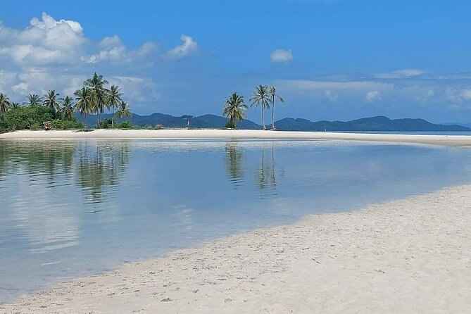 - Comfortable boat for cruising in Phang Nga Bay - The "Must-Do"! - Phang Nga Bay Stop: Caves, Limestone Cliffs, and Bird-Nest Rock Collectors