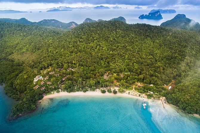 Koh Yao Noi Full Day Tour with Bike Ride & Lunch - Morning highlights: town streets, mangroves, rubber, and stilt fishing