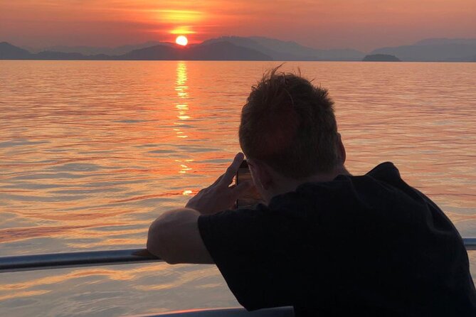 Phang Nga Bay Private Bioluminescence and Sea Canoeing Tour - Koh Panyee Village restaurant stop: seafood, vegetarian options, and sunset views