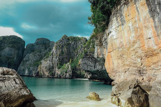 Phi Phi Island Viking Cave Monkey Beach Khai Island Tour from Phuket - Stop-by-stop guide: Phi Phi, bays, caves, and sand time