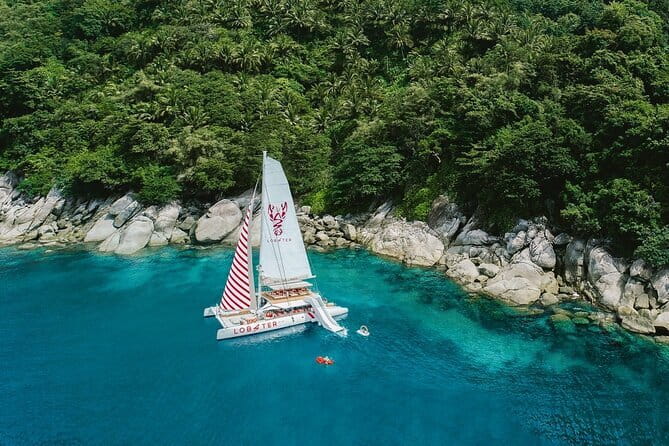 Phuket: Aeolos Catamaran Tour to Coral & Racha Islands + Lunch - Coral Island: snorkel sessions, banana beach time, and the jellyfish wildcard