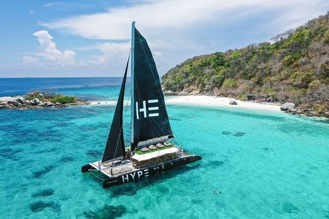 Phuket: Aeolos Catamaran Tour to Coral & Racha Islands + Lunch - Onboard comfort and included fun beyond snorkeling