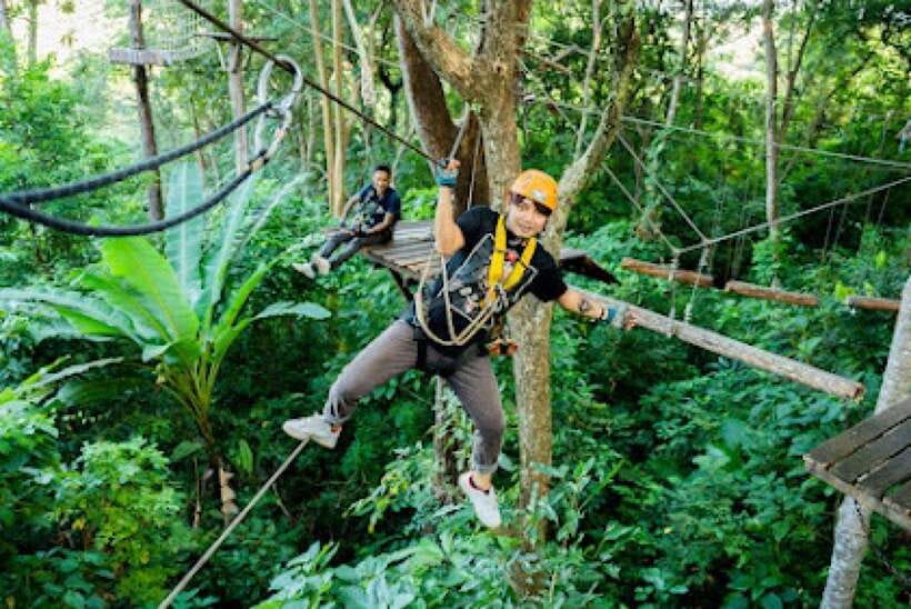 Phuket: ATV and ZipLine Adventure View Big Buddha Visit - Zipline escape: straps, helmet, and gliding between trees