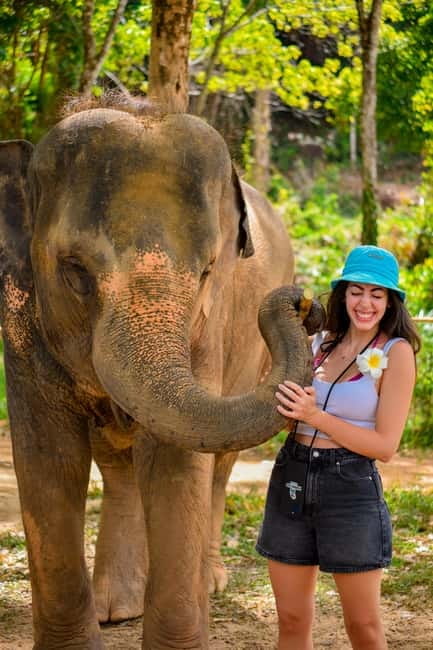 Phuket:Beach walk with elephants, rain & care. 2.5 hours - Guides, elephant handlers, and how the experience feels in person