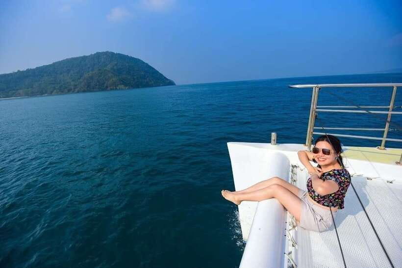 Phuket: Coral Yacht Boat Tour to Coral Island with Sunset - Yanui Bay and Raya Island Snorkeling: Coral and Fish With a Lunch Break