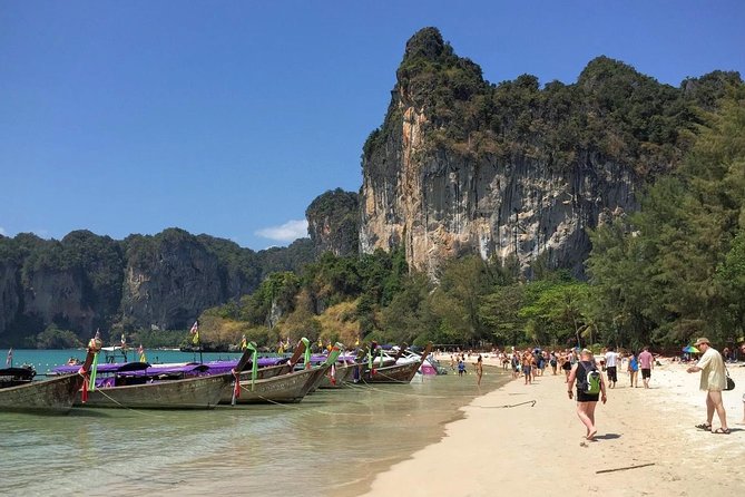 Phuket to Railay Beach by Ao Nang Princess Ferry - Railay West Beach Landing: Longtail Boat, Shallow Water, and Wet Shoes