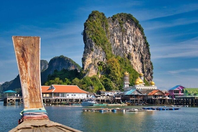 Private James Bond Island Canoeing Long-tail Boat Tour w/ Lunch - Wat Suwan Kuha Cave Temple: the golden reclining Buddha moment