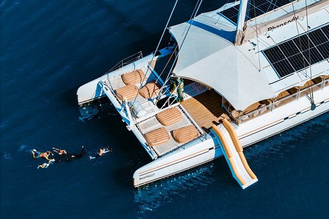 Rhapsody Phuket Coral & Racha Sunset Catamaran Cruise - Racha Yai afternoon snorkeling, sea toys, and the energy shift