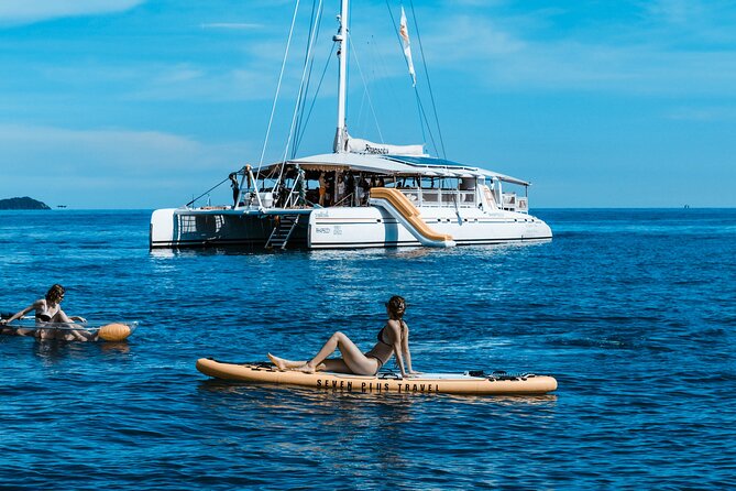 Rhapsody Phuket Coral & Racha Sunset Catamaran Cruise - The return cruise party, afternoon tea, and sunset near Promthep Cape